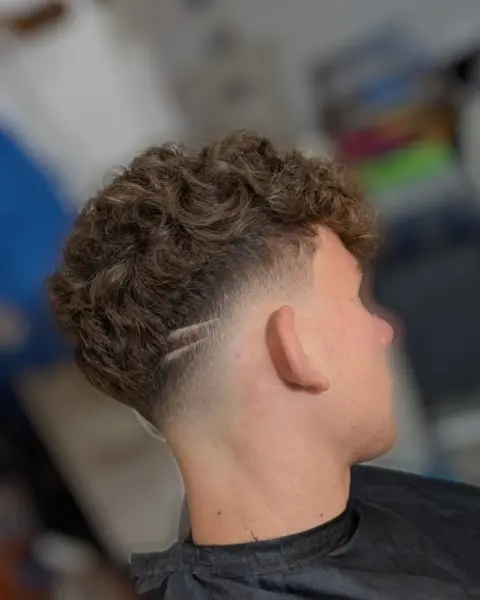 Ricci con taper e linea – taglio uomo StreetBarber